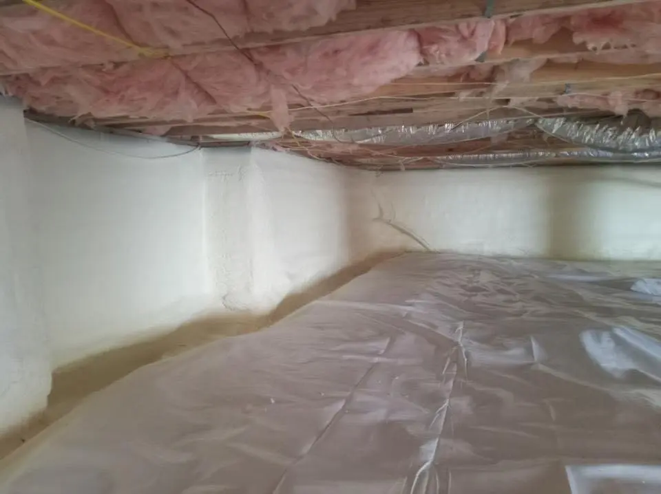 Crawl space encapsulation with closed-cell spray foam for Flat Roof Repair in Woodstock